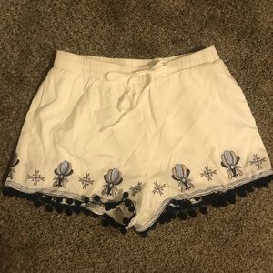 Shorts with embroidered pattern